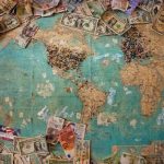 Money Travel - U.S. dollar banknote with map