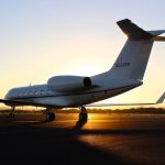 Private Jet - architectural photography of white aircraft