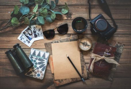 Travel Gadgets - photo of assorted items on wooden table