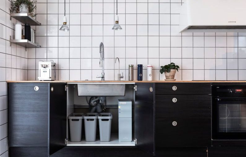 Water Purifier - black and silver kitchen cabinet