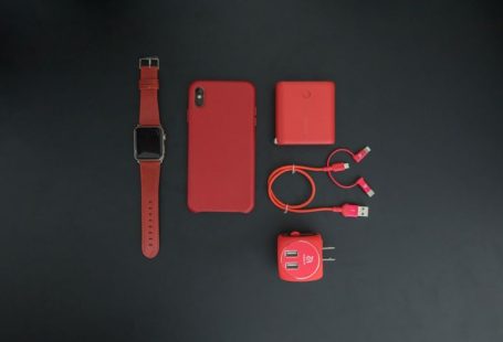 Tech Accessories - red iPhone and red smartwatch
