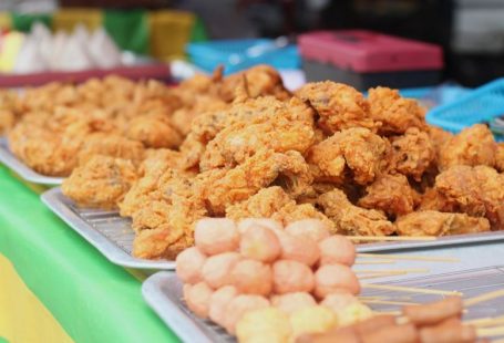 Local Delicacies - brown cookies on white ceramic plate