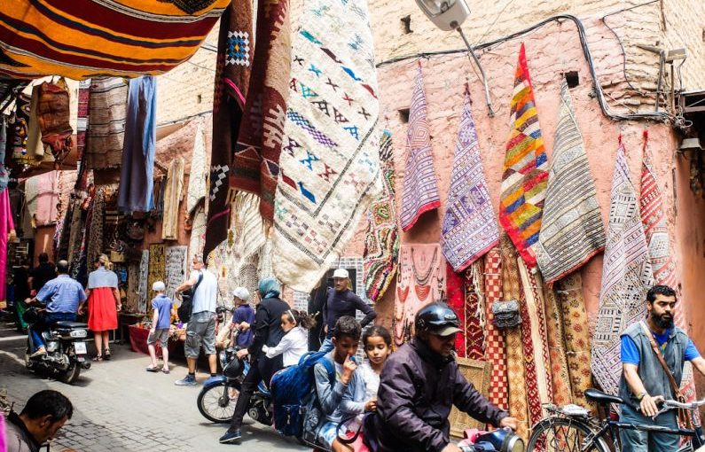 Morocco Market - man with two kids riding on a motorcycle