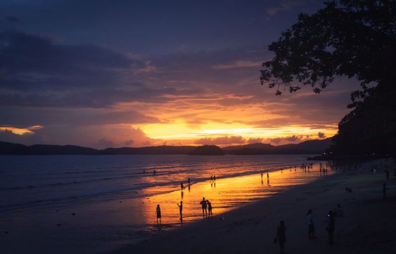 Thailand Beaches - people standing on seashore during golden hour