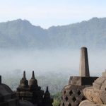 Sacred Sites - a view of a mountain range from a temple