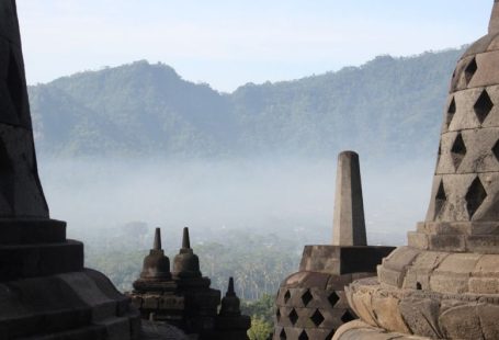 Sacred Sites - a view of a mountain range from a temple