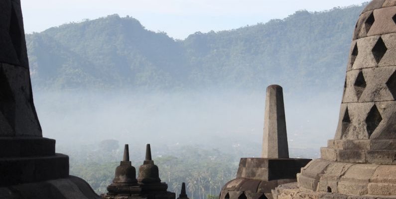 Sacred Sites - a view of a mountain range from a temple