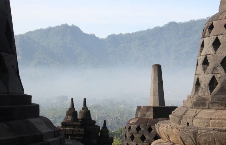 Sacred Sites - a view of a mountain range from a temple