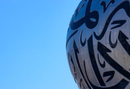 World Museums - blue and black globe with white wings