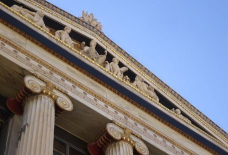Cultural Photography - a close up of the top of a building with columns