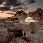 Indigenous Culture - a stone building in the middle of a desert