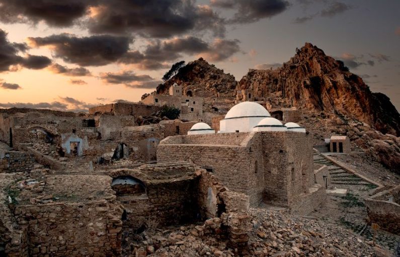 Indigenous Culture - a stone building in the middle of a desert