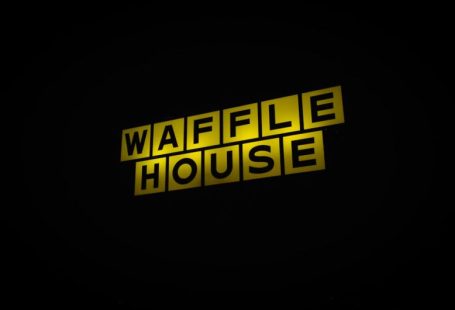 Affordable Hotel - a yellow sign that says waffle house on it