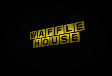 Affordable Hotel - a yellow sign that says waffle house on it
