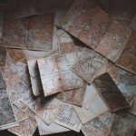 Solo Budget Travel - maps lying on the floor